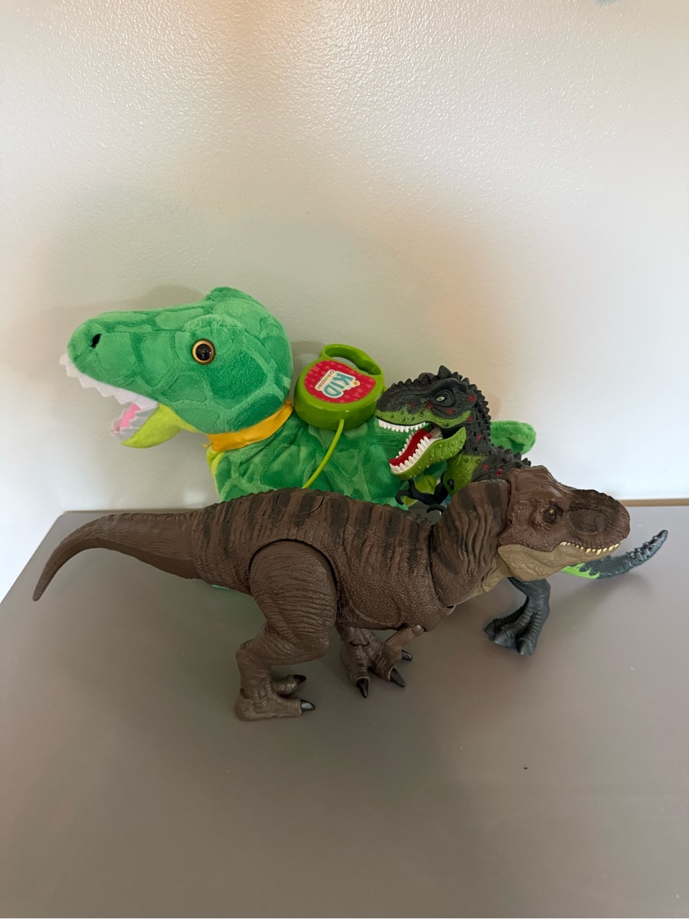 Assorted Dinosaur Toys - Green Plush & Brown T-Rex Figures